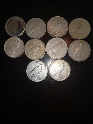 10 various dates peace dollars