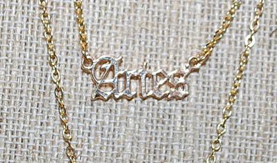 Collection of 2 ZODIAK SIGN - "ARIES" NECKLACES - one with the Word and the other with the Constellation - both in Gold Tone...