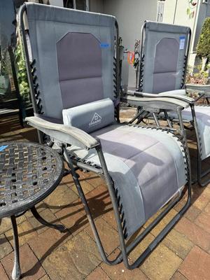 Pair Of Extra Wide Folding Chase lounges And Pair of Side Round Tables