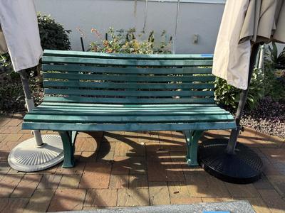 Plastic Green Garden Bench, Metal Table and 2 Umbrellas