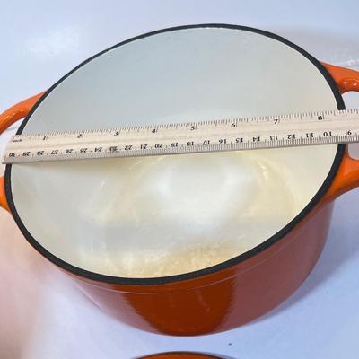 LOT 50: Two Rachel Ray Cast Iron Dutch Ovens