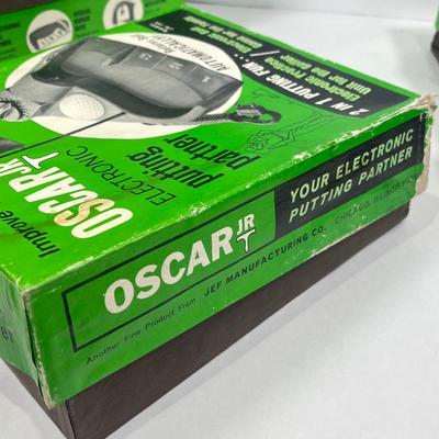 LOT 54A: Six Vintage Oscar Jr. Electronic Putting Partners