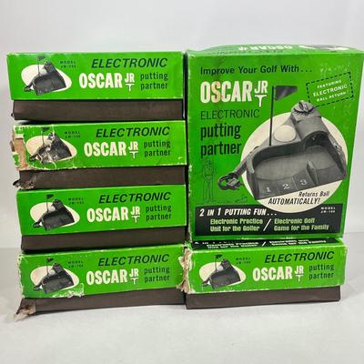 LOT 54A: Six Vintage Oscar Jr. Electronic Putting Partners