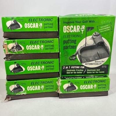 LOT 54A: Six Vintage Oscar Jr. Electronic Putting Partners