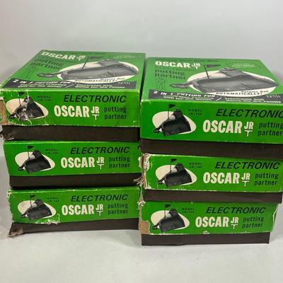 LOT 54A: Six Vintage Oscar Jr. Electronic Putting Partners