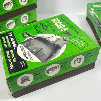 LOT 54A: Six Vintage Oscar Jr. Electronic Putting Partners