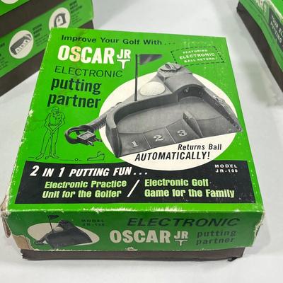 LOT 54A: Six Vintage Oscar Jr. Electronic Putting Partners