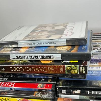 LOT 67: DVDs and VHS Tapes - Most New, Sealed