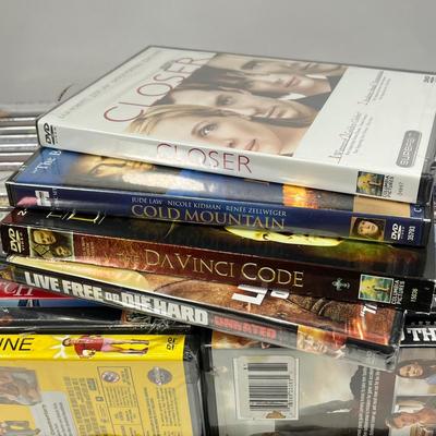 LOT 67: DVDs and VHS Tapes - Most New, Sealed