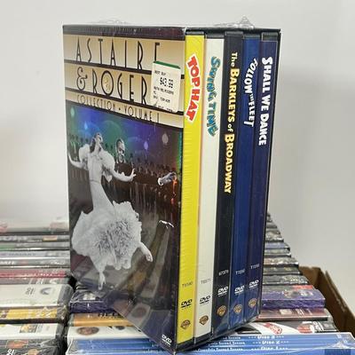 LOT 67: DVDs and VHS Tapes - Most New, Sealed