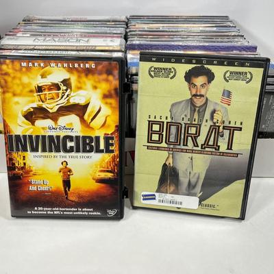 LOT 67: DVDs and VHS Tapes - Most New, Sealed