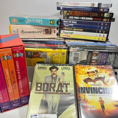 LOT 67: DVDs and VHS Tapes - Most New, Sealed