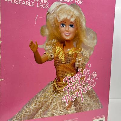 LOT 68: Vintage Posin' Picture Perfect Doll and Mr. Christmas Jukebox Rock