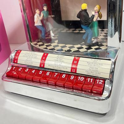 LOT 68: Vintage Posin' Picture Perfect Doll and Mr. Christmas Jukebox Rock