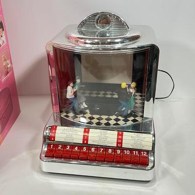 LOT 68: Vintage Posin' Picture Perfect Doll and Mr. Christmas Jukebox Rock