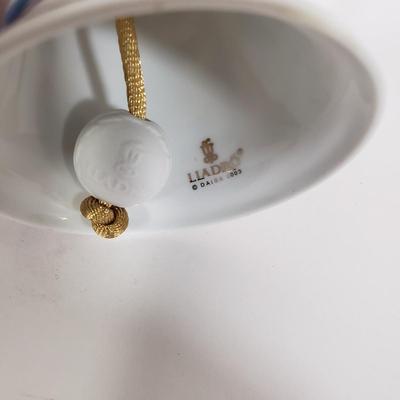 LOT 138: Lladro Under the Mistletoe Ball & Traditional Sounds Bell Ornaments