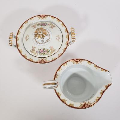 LOT 140: Cardinal Pattern China Set by Noritake