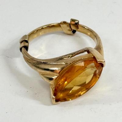 Sale Photo Thumbnail #7: Ring has an oval topaz stone approx. 5/8" x 5/16". total ring weight is 4.8g.  Very nice condition.