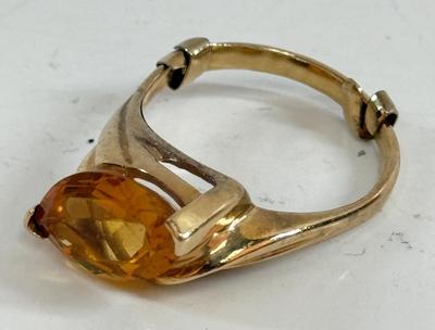 Sale Photo Thumbnail #8: Ring has an oval topaz stone approx. 5/8" x 5/16". total ring weight is 4.8g.  Very nice condition.
