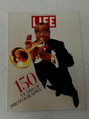 Sale Photo Thumbnail #294: Hundreds of black & white and color photos. Good condition. Published in 1995.