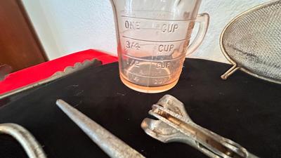 PINK DEPRESSION GLASS LIQUID MEASURING CUP, FORD CO-OPERATIVE TONGS, BOTTLE OPENERS AND MORE