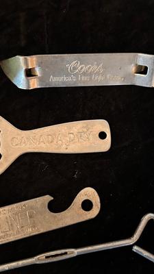 OLD BLUE BALL CANNING JARS, GREEN FLOWER FROG, AND A VARIETY OF BOTTLE OPENERS