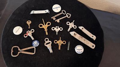 SEVERAL CLOCK KEYS, BOTTLE OPENERS AND A COUPLE SKELETON KEYS