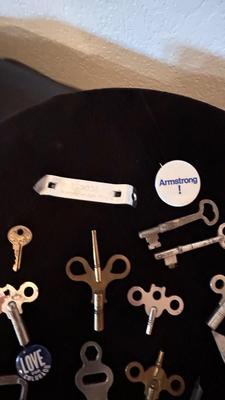 SEVERAL CLOCK KEYS, BOTTLE OPENERS AND A COUPLE SKELETON KEYS