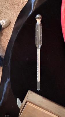 COORS TRAY, BOTTLE OPENERS, AND A GLASS GRAVITY HYDROMETER USED FOR ALCOHOL CONTENT OT BATTERY CHARGE LEVEL