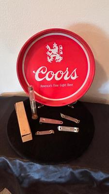 COORS TRAY, BOTTLE OPENERS, AND A GLASS GRAVITY HYDROMETER USED FOR ALCOHOL CONTENT OT BATTERY CHARGE LEVEL