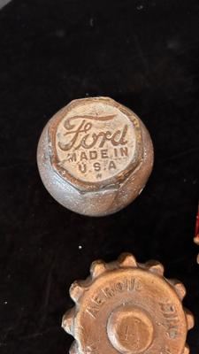FORD MODEL T HUB CAP, HEAVY BRASS 1-1:/2 CAP, AND A 7/8” SPARK PLUG