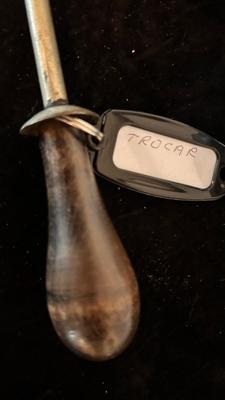 ESSEX MOTORS DETROIT HUB CAPS AND TROCAR TOOL