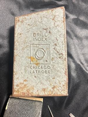 A VARIETY OF DRILL BITS, FILES AND HAND TOOLS