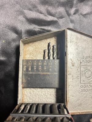A VARIETY OF DRILL BITS, FILES AND HAND TOOLS