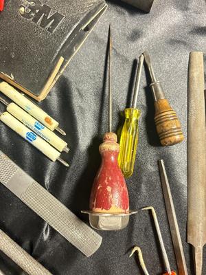 A VARIETY OF DRILL BITS, FILES AND HAND TOOLS