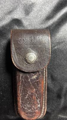 SCHRADER FOLDING KNIFE W/SHEATH, IMPERIAL POCKET KNIFE W/SAW & UNKNOWN BRAND KNIFE AND SHARPENING STONE