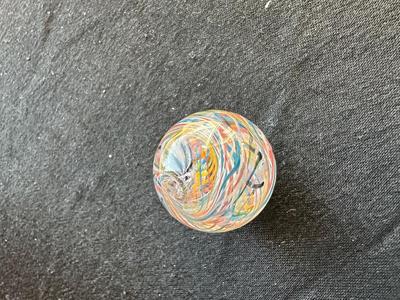 HANDMADE MARBLE WITH A VIBRANT SWIRLING RAINBOW DESIGN