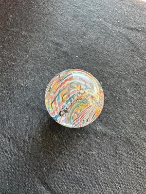 HANDMADE MARBLE WITH A VIBRANT SWIRLING RAINBOW DESIGN