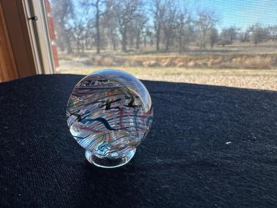 HANDMADE MARBLE WITH A VIBRANT SWIRLING RAINBOW DESIGN