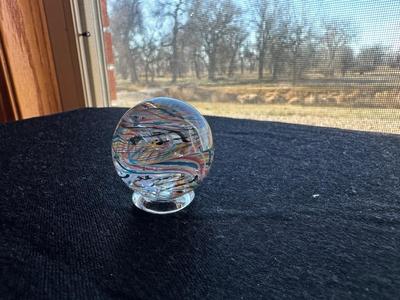 HANDMADE MARBLE WITH A VIBRANT SWIRLING RAINBOW DESIGN