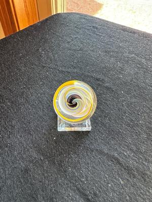 HANDBLOWN GLASS MARBLE WITH INTERNAL SWIRL WITHIN A MULTICOLORED LATTICINO SWIRL