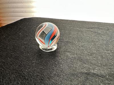 HANDBLOWN MULTICOLORED MARBLE WITH A DYNAMIC SWIRLING DESIGN