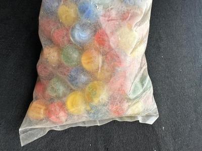 1 UNOPENED BAG OF MARBLES