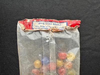 1 UNOPENED BAG OF MARBLES