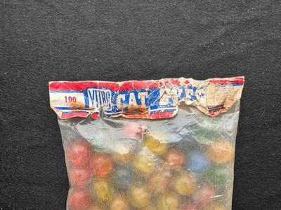 1 UNOPENED BAG OF MARBLES