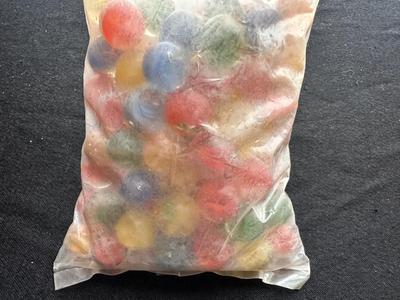 1 UNOPENED BAG OF MARBLES