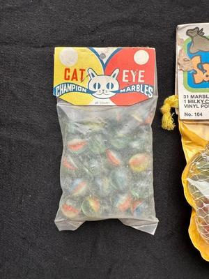 2 UNOPENED BAGS OF MARBLES (3)
