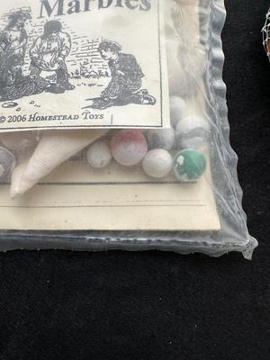 2 UNOPENED BAGS OF MARBLES (9)