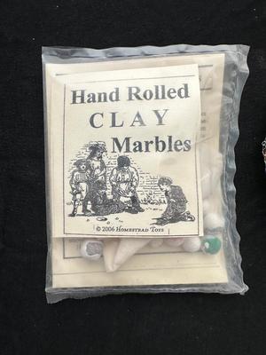 2 UNOPENED BAGS OF MARBLES (9)