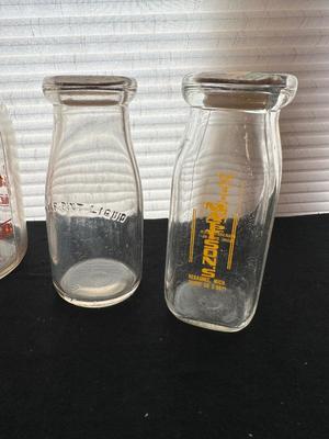 GLASS MILK BOTTLES, SOME FROM LOCAL DAIRIES